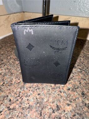 MCM Black Embossed Monogram Bi-Fold Wallet like new
